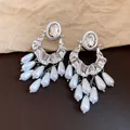 Vintage silver-tone tassel earrings with sparkling rhinestones and white teardrop pearls - Silver