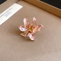 Macro view of a vintage pink tulip flower ring featuring elegant gold-toned edges - Open Ring / Pink
