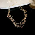 Elegant 18K gold plated multi-layer necklace with sparkling zircon flower pendants - Gold Necklace with Purple Zirconia / Purple
