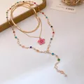 Squisita collana dorata multistrato vintage con ciondolo a fiore rosa e perle colorate - Stile Fiore Rosa Rosso E Colorato