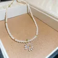 Elegant 18k gold plated zirconia flower daisy pendant pearl necklace in a jewelry box - 18K Gold Plated Daisy Style / Gold-White