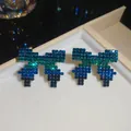 Macro detail of pixel-art bow earrings featuring blue and green rhinestone gradient - 21# Silver Needle - Gun Black - Green