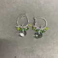 Elegant clear glass ball hoop earrings featuring vibrant green crystal bead accents. - Jasmine Green Grape Ball Style / Silver Post Green Yellow
