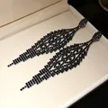 Elegant long black rhinestone tassel earrings displayed in a luxury cream jewelry box - 46# Silver Needle - Gun Black