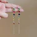 Detail shot of multi-color round zircon tassel earrings with sterling silver needles - Stud Earrings / Colorful