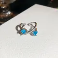 Close-up of elegant silver open ring with dual blue zircons and pavé diamonds - Square Double Blue Zirconia (8#) / Silver Blue