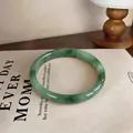 Elegant translucent green chalcedony bangle with a minimalist polished smooth finish - Style 5