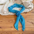 Macro view showing the detailed texture of elegant blue chiffon rose flower scarf necklace - Two-Piece Set / Blue