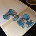 Exaggerated bowknot earrings featuring light blue zircons and silver rhinestones - Silver Post Bowknot (HE32637) / Silver-Deep Blue Zirconia