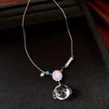 Zilverkleurige halsketting met schattige hondenhang van doorzichtig hars - Zilver-Transparant