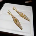 Exquisite 18K gold plated earrings with sparkling CZ pavé and hollow diamond design - Gold