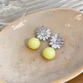 Close-up of elegant flower stud earrings with yellow beads and sparkling zircon - Silver Needle-Silver-Yellow