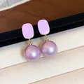 Close-up of French style enamel square purple pearl drop earrings with elegant luster - Gold Style / Lavender