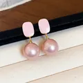 Detail of French style pink enamel square stud earrings with dangling pink pearls - Gold Style / Sakura Pink