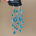 Elegant long drop earrings featuring blue butterfly glass crystals with a gold-tone finish - 22# Silver Pin-Blue