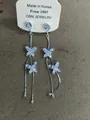 Elegant long tassel silver earrings featuring sparkling zircon butterfly charms - Butterfly Style / Silver