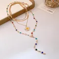 Elegant multi-layered gold necklace with flower pendant and colorful stone accents - Set of Multi-piece (Multicolor) / Gold