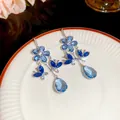 Elegant silver needle tassel earrings with blue flower, butterflies and teardrop gem. - 61# Silver Needle - Blue