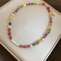 Close-up of vibrant dopamine colorful stone and pearl beaded necklace with gold clasp - Necklace / Colorful