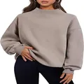 Detailed view showing the fit of a thick mock neck oversized women's sweatshirt in taupe - S / Tops / Coffee
