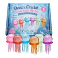 Detailed view of 6 colorful Ocean Crystal jellyfish stress relief toys and retail box. - Jellyfish Squishy 6-Piece Set / Color Box