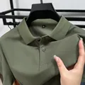 Close-up view of olive green cotton piqué polo shirt for men showing collar detail - M / Army Green