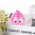 Süßes rosa Glitzer-Poop-Squishy-Spielzeug zum Stressabbau mit einem Emoji-Gesicht - Rosa