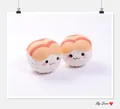 Adorable sushi-shaped slow rebound squishy toy featuring cute smiling faces for stress relief - Sushi