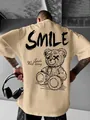 Πίσω όψη ανδρικού oversized χακί streetwear t-shirt με γοτθικό τύπωμα αρκούδας και κείμενο. - S / Χακί