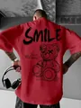 Λεπτομερής πίσω όψη κόκκινου oversized t-shirt με γοτθικό τύπωμα αρκούδας SMILE - S / Κόκκινο