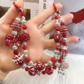 Cadena de teléfono hecha a mano con cuentas rojas y plateadas, lazo de strass y corona - A5-a