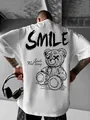 T-shirt bianca oversize da uomo con grande stampa orso gotico e la scritta SMILE - S / Bianco