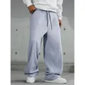 Pantaloni sportivi larghi grigi da uomo con gamba larga e coulisse per uno stile streetwear - 3XL / Grigio chiaro