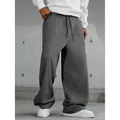 Pantaloni sportivi larghi grigi da uomo con coulisse regolabile in vita e vestibilità casual - 3XL / grigio scuro