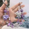 Handmade purple beaded phone strap featuring sparkling heart and bow charms for bags - Purple Heart Rose Bow Style (A5-R)