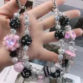Handmade pink and black beaded phone strap with heart charm and crystal accents - Pink Heart Flower Light Luxury Style (A5-T)