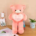 Doux ours en peluche rose tenant un cœur brodé 'I Love You' pour un cadeau d'anniversaire - LOVE Rose / 55 cm