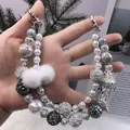 Handmade beaded phone chain with pearls, fluffy pom-poms, and jellyfish charm - Artificial Pearl Silver Jellyfish Shape Style (B2-G)