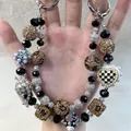 Exquisite handmade beaded phone charm with leopard print and checkerboard heart beads - Leopard Print Rhinestone Ball Checkerboard Heart Style (B2-J)