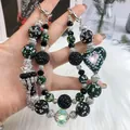 Handcrafted green and black rhinestone beaded phone charm featuring a heart pendant detail - Black Green Rhinestone Heart Crown Style (B2-N)