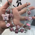Handmade pink and silver beaded bag charm with sparkling crystal accents and star charm. - Pink Silver Pentagram Crown Jellyfish Style (C2-U)