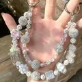 Elegant handmade phone chain featuring sparkling silver rhinestone beads and white pearls. - Silver White Phantom Crown Cube Style (D2-D)