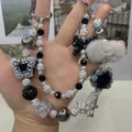 Handmade luxury beaded phone strap with white pearls, crystals and grey fur ball charms - Black White Grey Artificial Pearl Butterfly Pom Pom Style (D2-G)