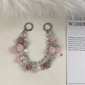 Exquisite handmade beaded phone chain featuring pink fur pom-poms, pearls and crystals - Pink Rhinestone Pom Pom Crystal Bead Style (E1-27)