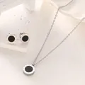 Elegant titanium steel jewelry set featuring a black pendant and Roman numeral engravings. - 34b4 Steel Color Suit