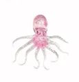 Vista detallada de un juguete antiestrés de pulpo rosa translúcido brillante con purpurina - Pulpo de Colores para Apretar / Rosa