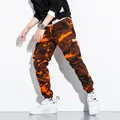 Men's orange camouflage cargo pants with multi-pockets and elasticated cuffs in streetwear style. - M / Camo Joggers / Camouflage Orange Red