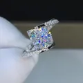 Elegant silver-tone moissanite engagement ring with 1-carat brilliant round stone - Adjustable Open Ring / Double Loop Crisscross Spiral Style (MS004) / Silver