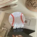 Detail shot of a white acrylic baseball hair claw clip with red stitching patterns - White Baseball