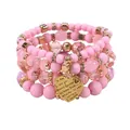 Bohemian style pink beaded stack bracelet with multi-language engraved heart charm - Pink